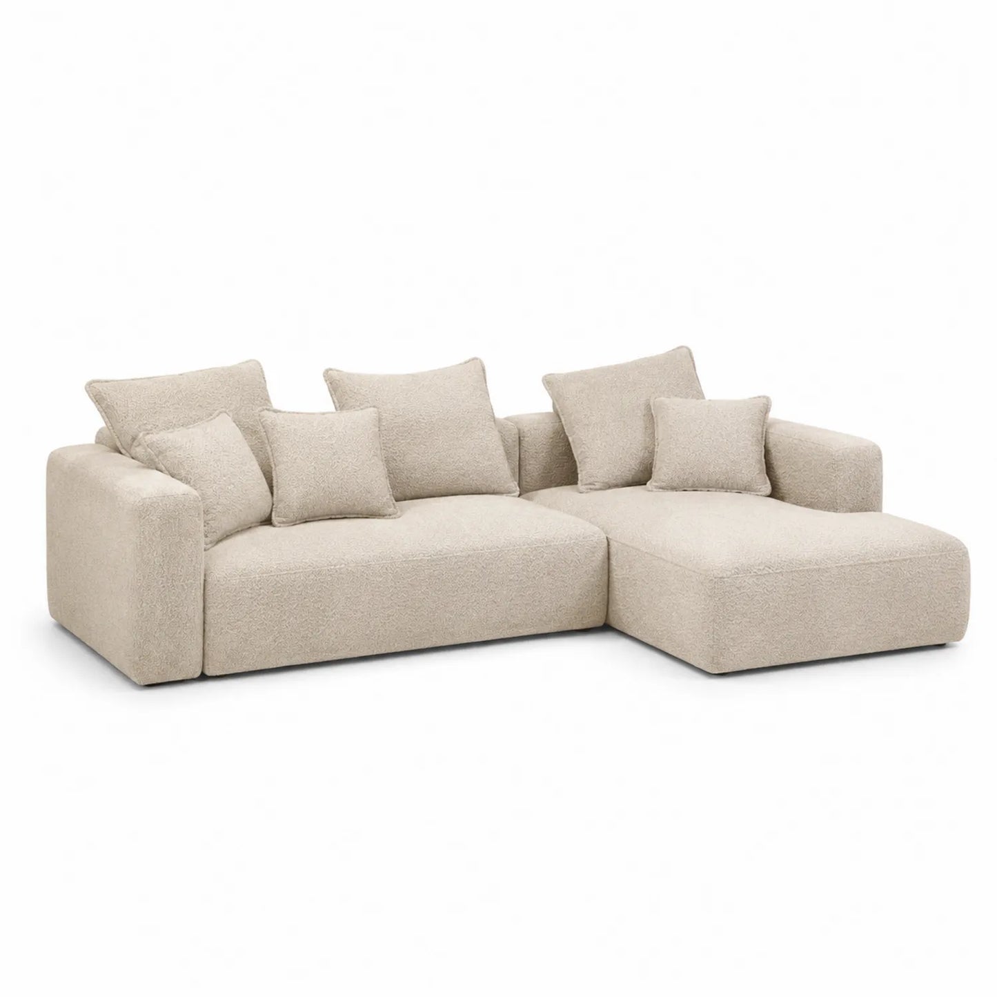 Divano ad angolo in tessuto beige con chaise longue e cuscini